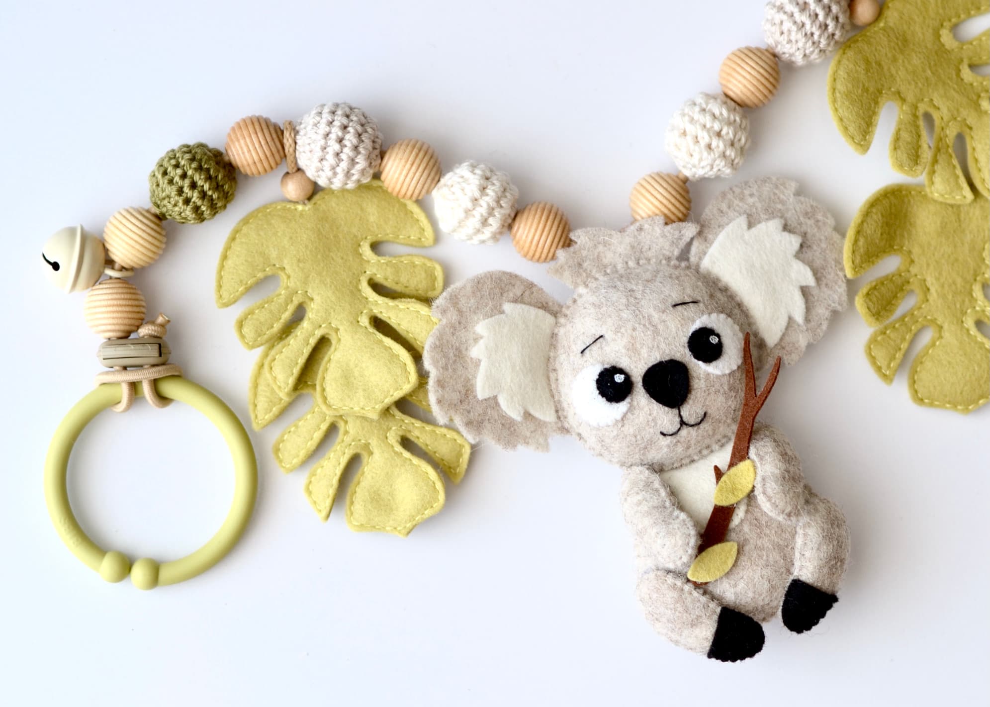 Kinderwagenkette Koala Monstera Hellgrün